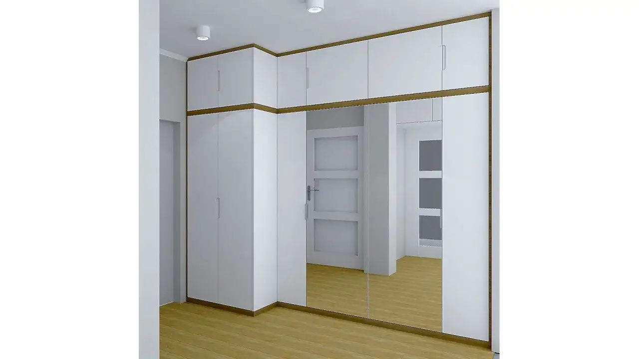 Nowoczesny pawlacz pod sufitem z lustrzanymi drzwiami optycznie powiększa przestrzeń.